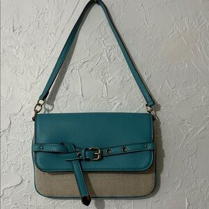 Anne Klein
Teal and Beige Shoulder Bag
Measurements - 10”x6”
Strap - 18”